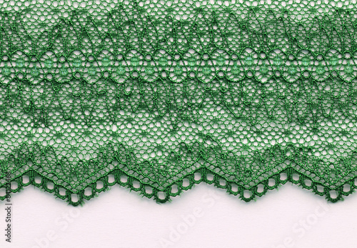 The macro shot of the green lace texture material