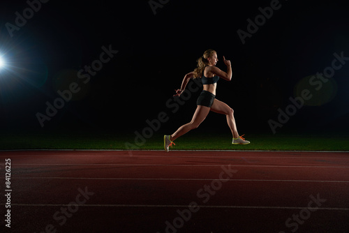 Athletic woman running on track © .shock