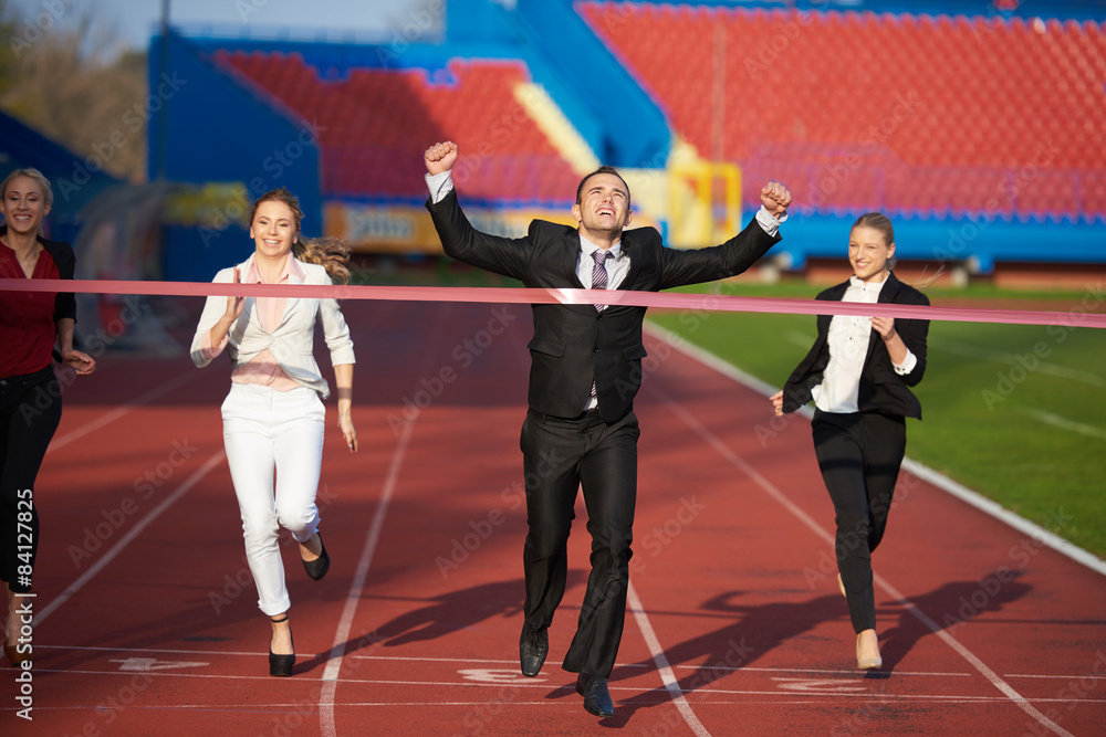 business people running on racing track