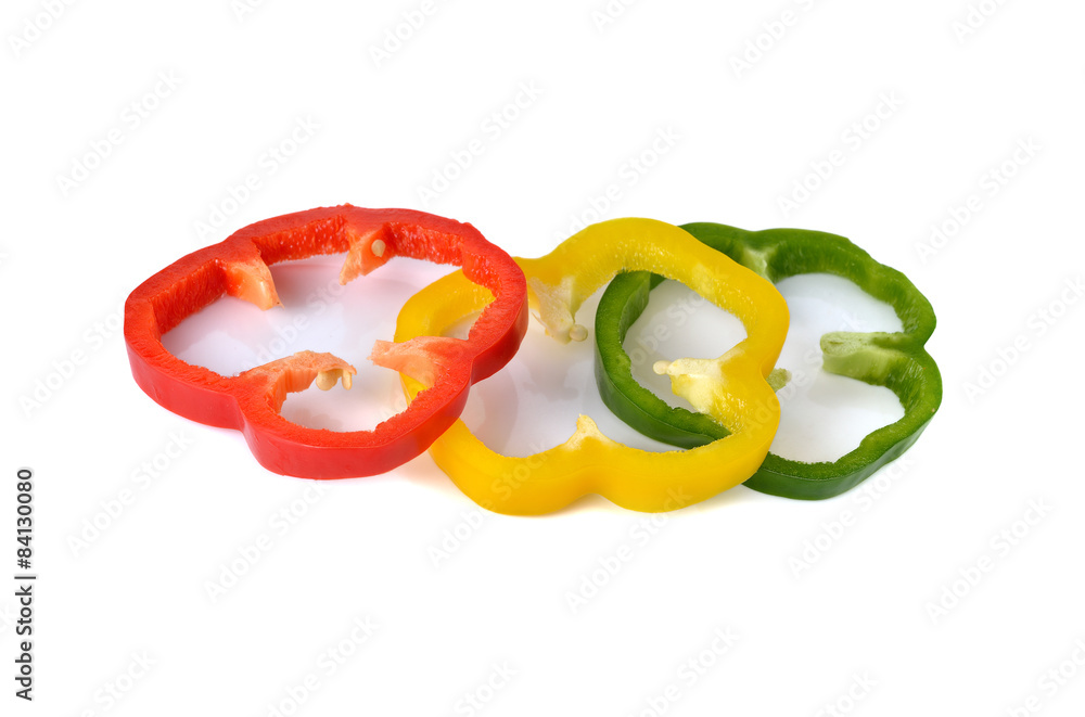 sliced red yellow green bell pepper on white background sliced red yellow green bell pepper on white background