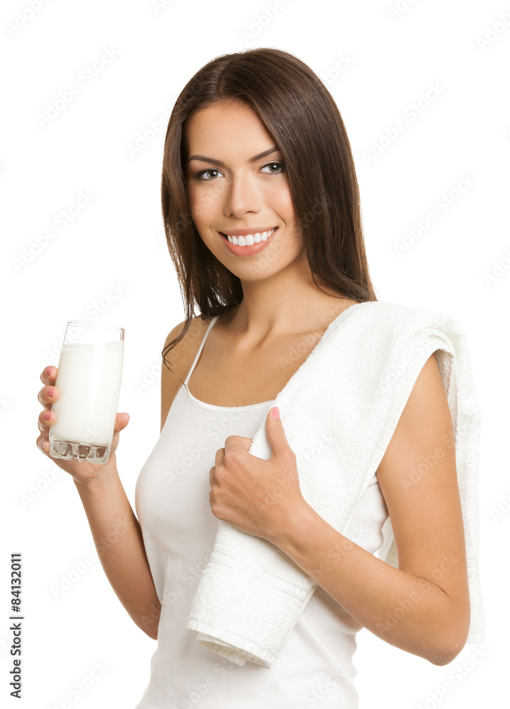 Smiling brunette woman drinking milk, isolated Smiling brunette woman drinking milk, isolated