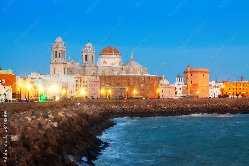  Cathedral and  embankment in evening. Cadiz