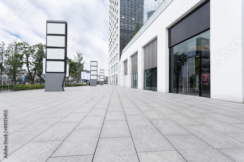 Empty road near modern building