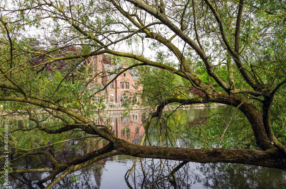Flemish style building in Minnewater lake, Fairytale scenery in Flemish style building in Minnewater lake, Fairytale scenery in