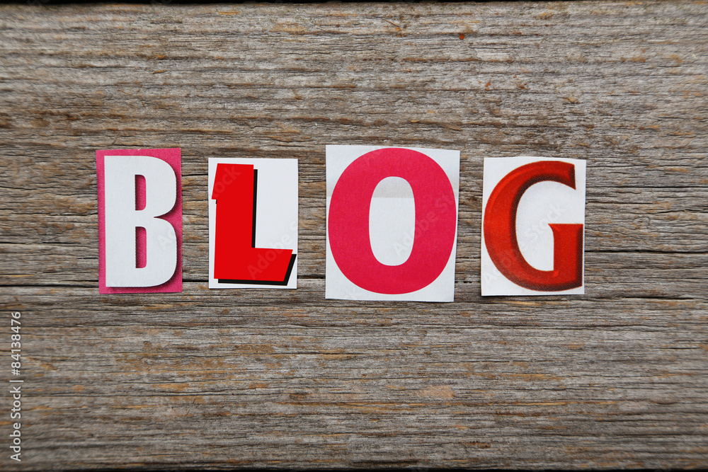 Fototapeta premium The word Blog in cut out magazine letters