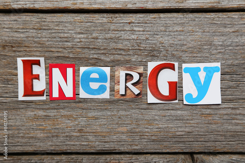 The word energy in cut out magazine letters