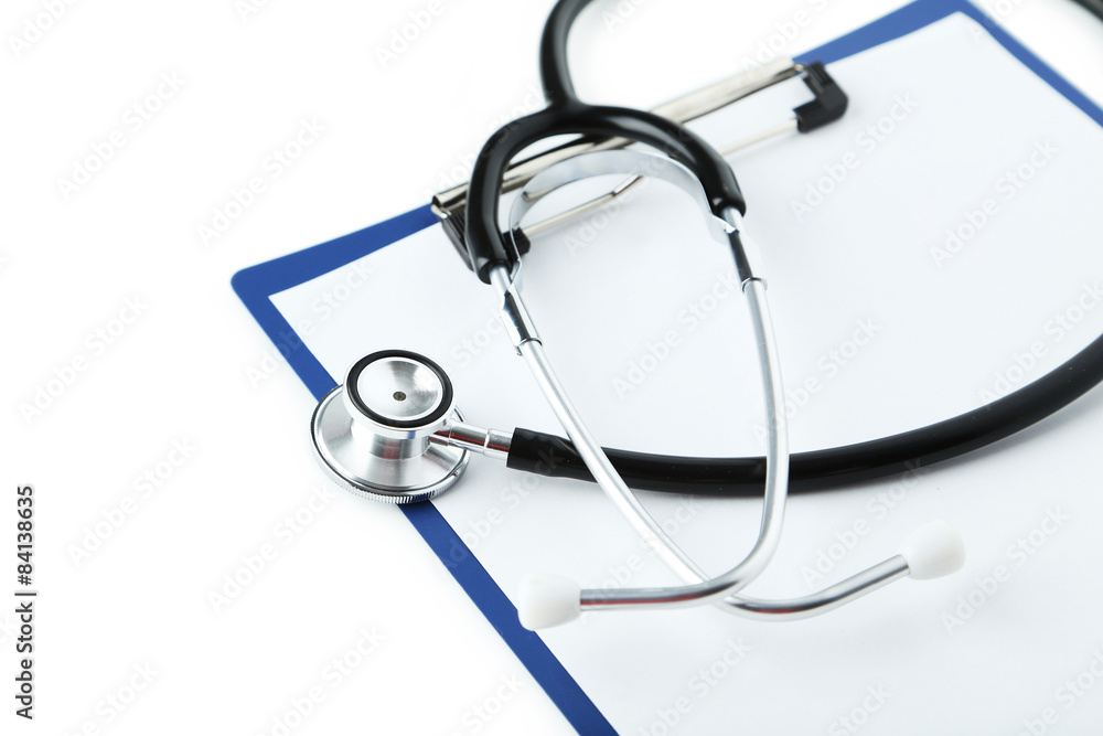 Stethoscope with tablet for notes on white background Stethoscope with tablet for notes on white background
