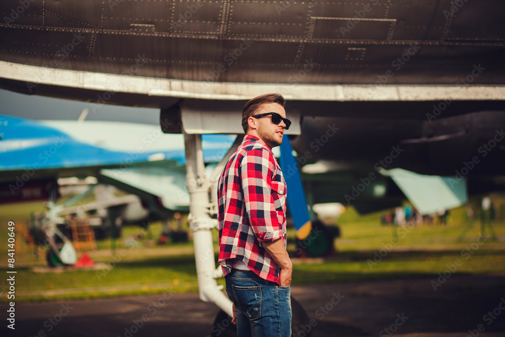 Fototapeta premium Stylish man in sunglasses and a shirt