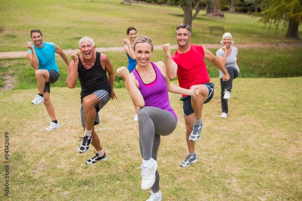 Obraz premium Happy athletic group training