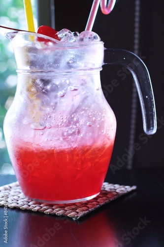 Red beverage mix soda on ice