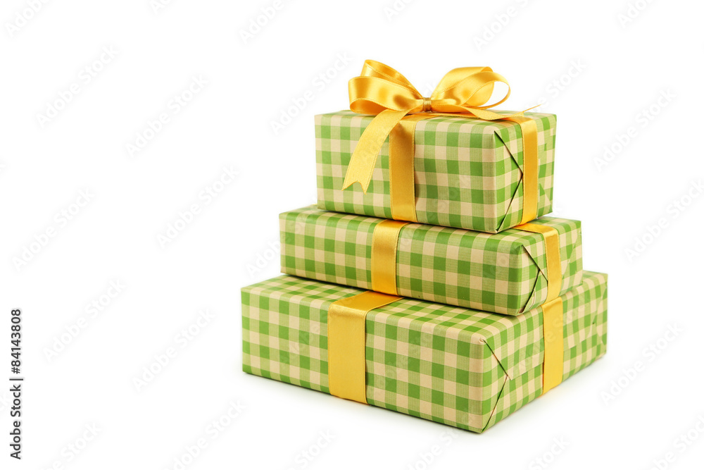 Obraz premium Gift box with golden bow isolated on white