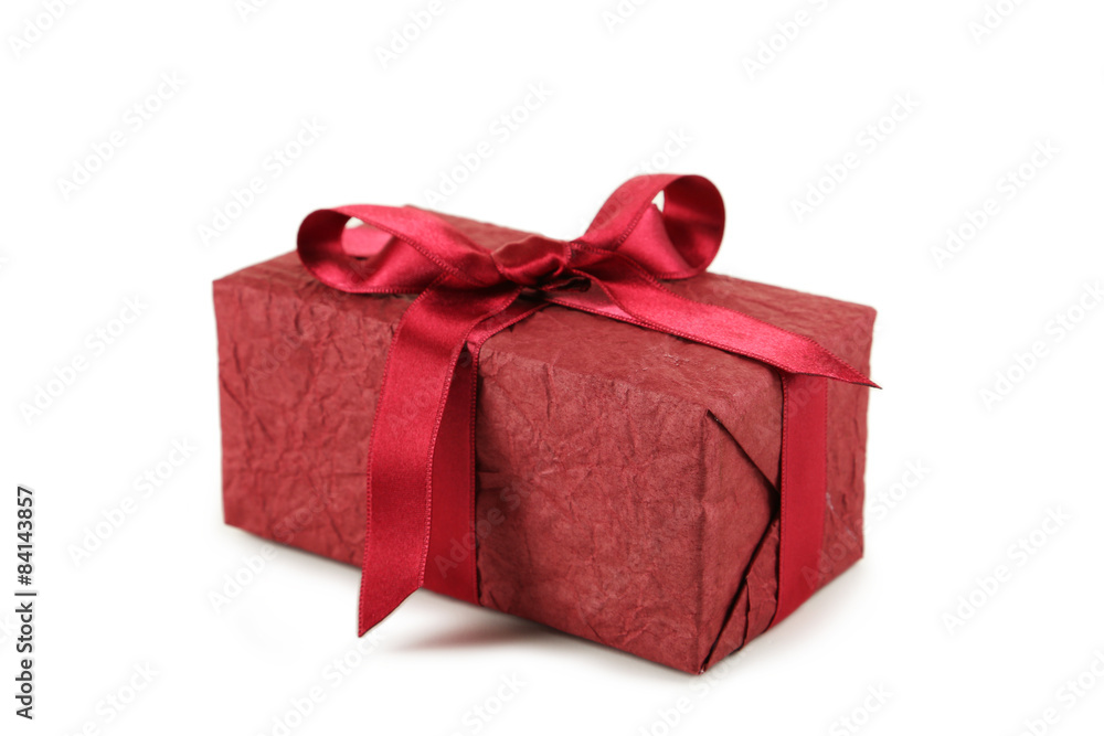 Obraz premium Gift box with burgundy bow isolated on white