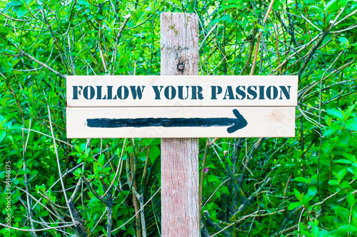 FOLLOW YOUR PASSION Directional sign © stanciuc