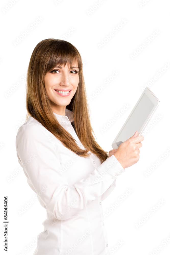 Young smiling business woman using tablet computer Young smiling business woman using tablet computer