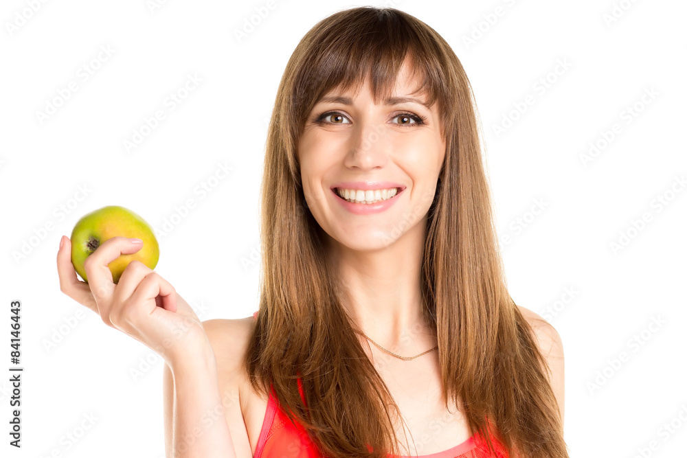 Young smiling girl holding green apple in hand. Fitness woman Young smiling girl holding green apple in hand. Fitness woman