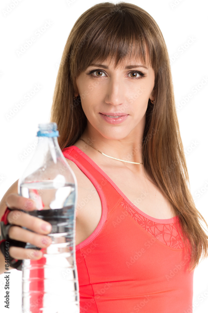 Young fitness woman with a bottle of water isolated Young fitness woman with a bottle of water isolated