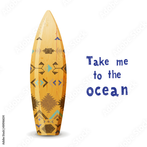 wooden surf board with tribal ornament