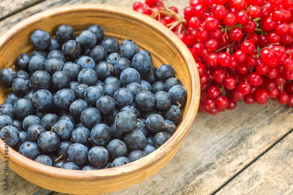 Wild berries on wood background. Wild berries on wood background.