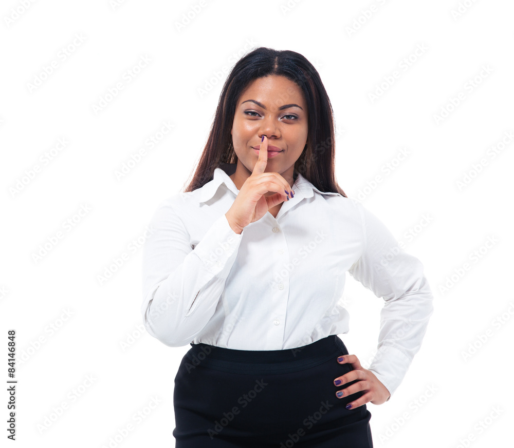 Afro american businesswoman with finger over lips Afro american businesswoman with finger over lips