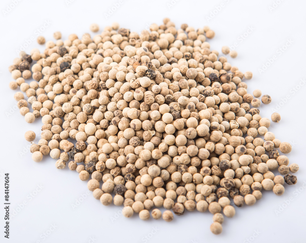 White pepper over white background White pepper over white background