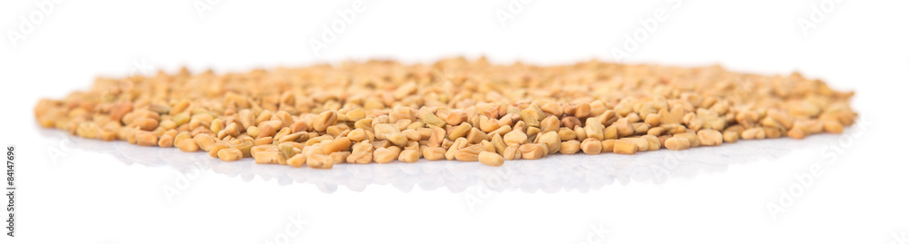 Fenugreek seeds over white background Fenugreek seeds over white background