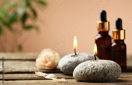 Beautiful spa composition on wooden table, on brown background