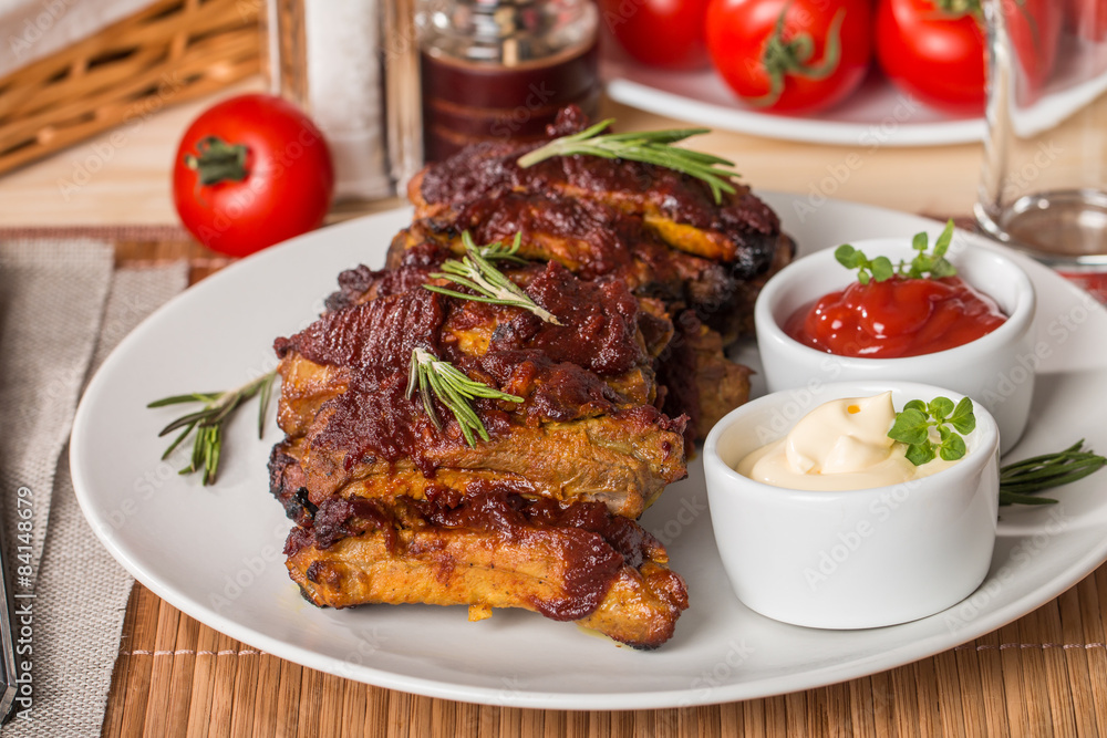 Grilled pork ribs in barbecue sauce