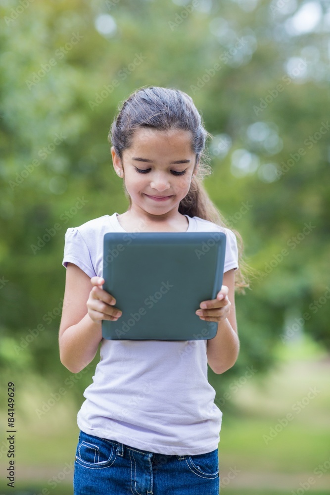 Little girl using her tablet Little girl using her tablet