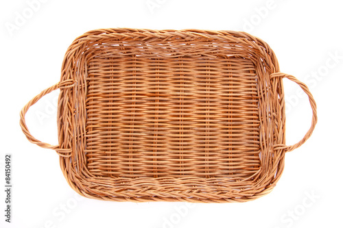 Brown wicker basket isolated on white background, top view
