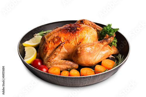 Roasted chicken and vegetables photo