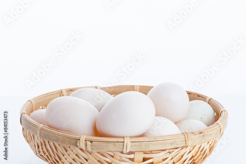 Wallpaper Mural Raw dirty duck eggs in the bamboo bowl basket on white backgroun Torontodigital.ca