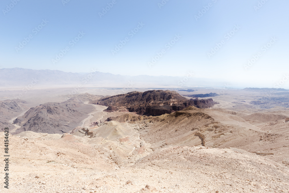 Black desert mountain cliffs.