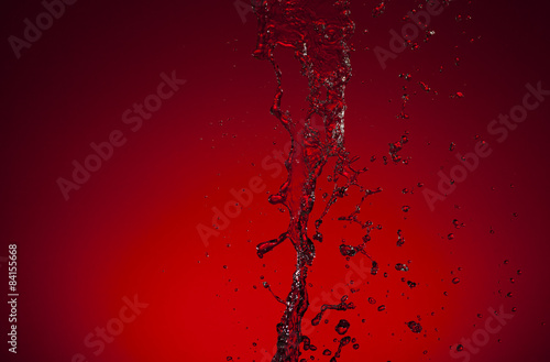Texture of water on red background