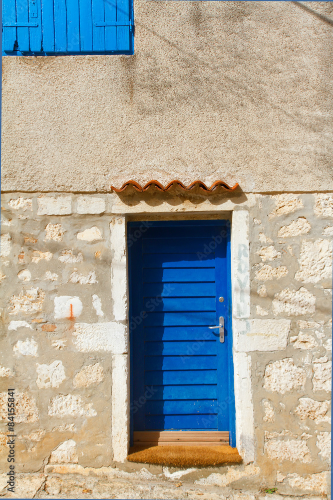 Fototapeta premium The wall and the window, mediterranian architecture. Rovinj, Cro