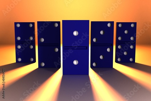 Fotografie Blue domino on orange background