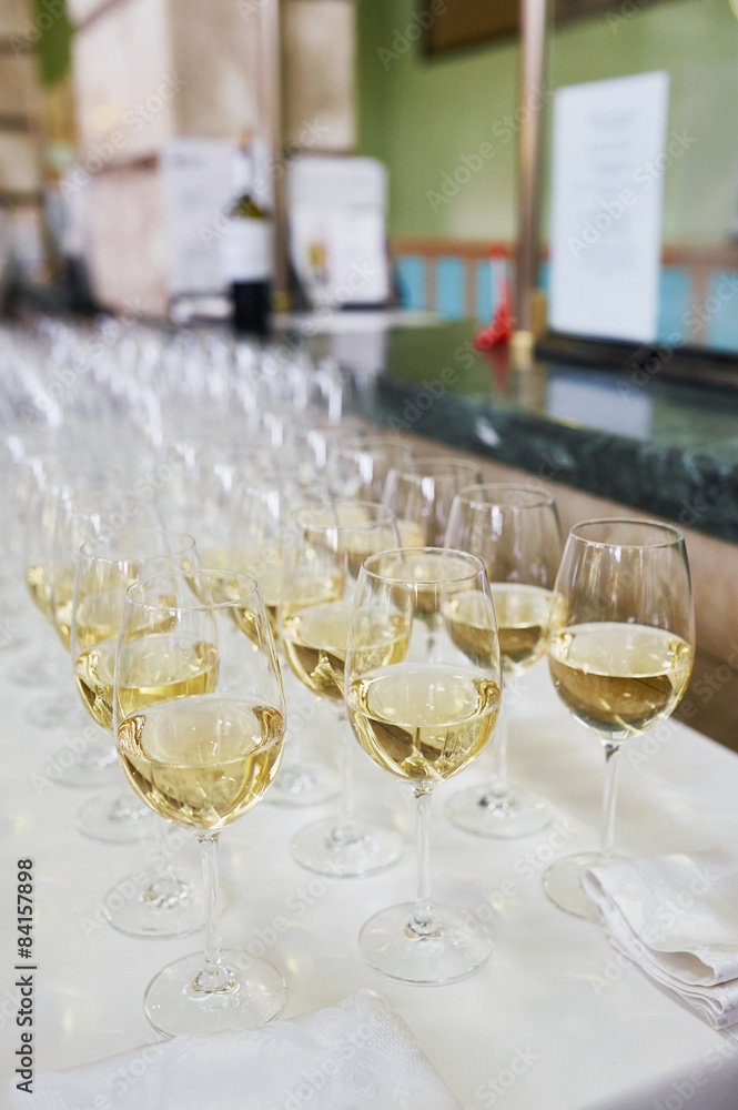 glasses with Champagne on white table