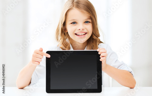 girl with tablet pc at school