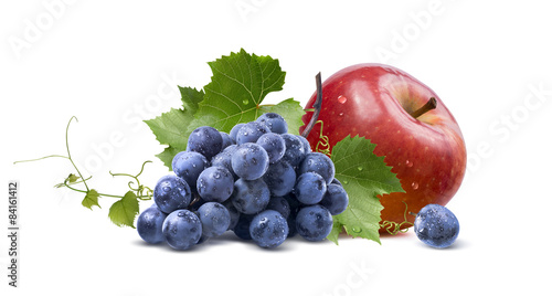 Wet grapes and red apple isolated on white background