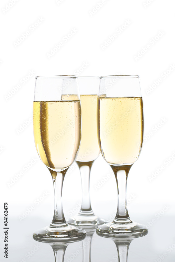Glasses of champagne isolate on white