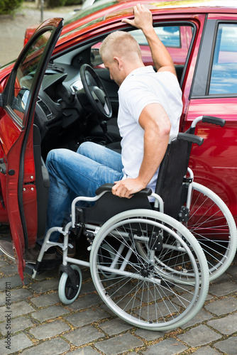 Handicapped Man Boarding In His Car © Andrey Popov