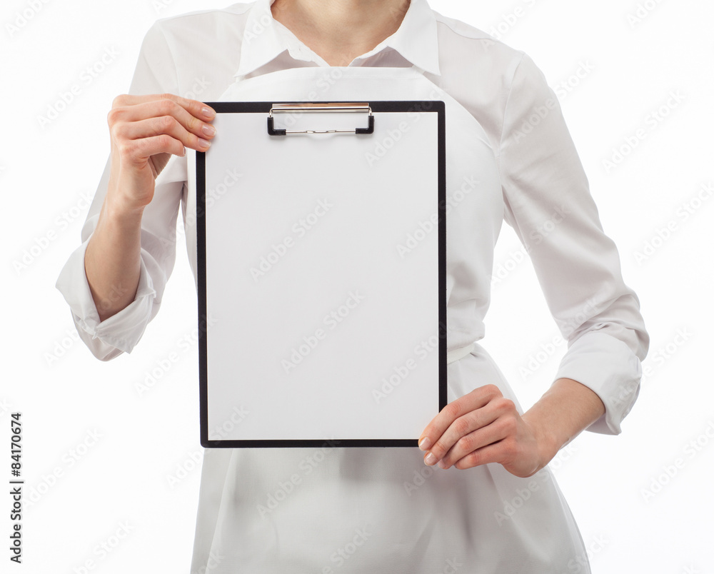 Woman cook's hands showing blank clipboard Woman cook's hands showing blank clipboard