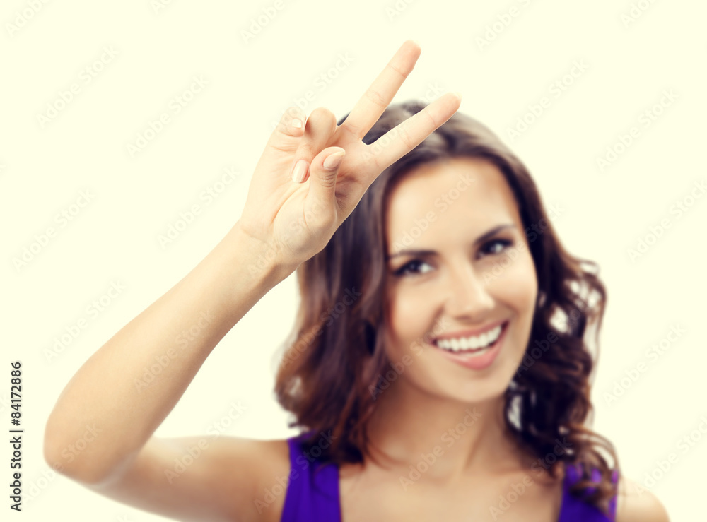 Woman showing two fingers or victory gesture Woman showing two fingers or victory gesture