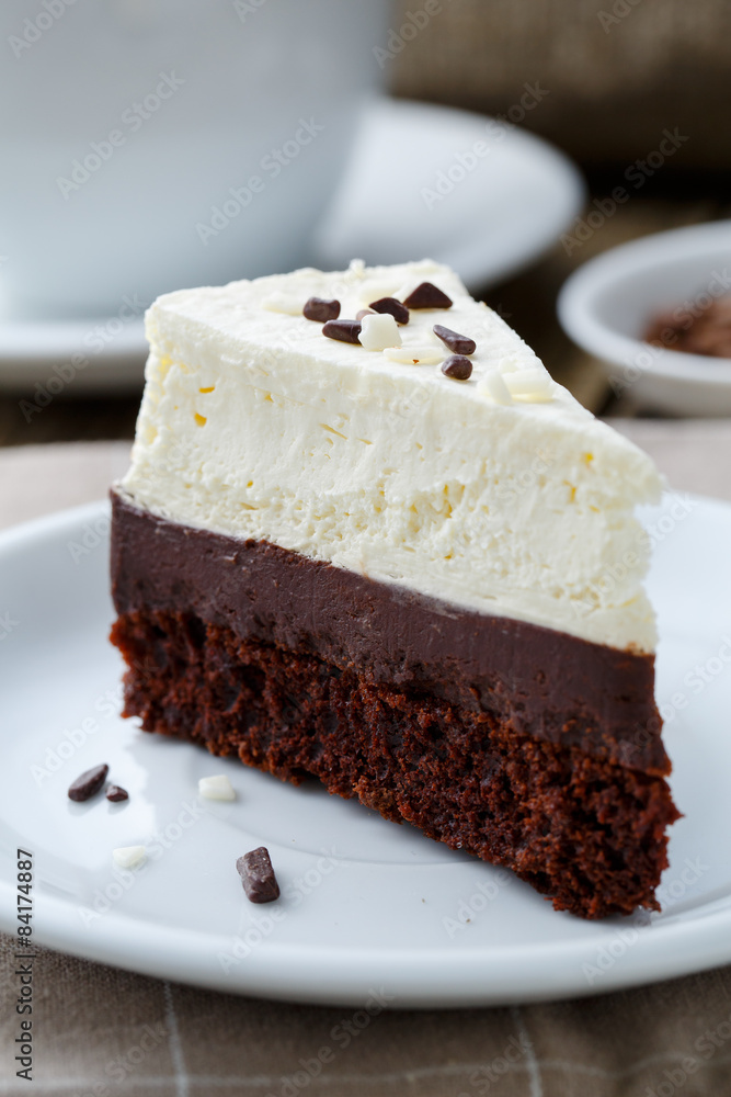 Vanilla cheesecake slice on wooden background. Vanilla cheesecake slice on wooden background.