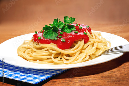 Spaghetti with tomato sauce and herbs
