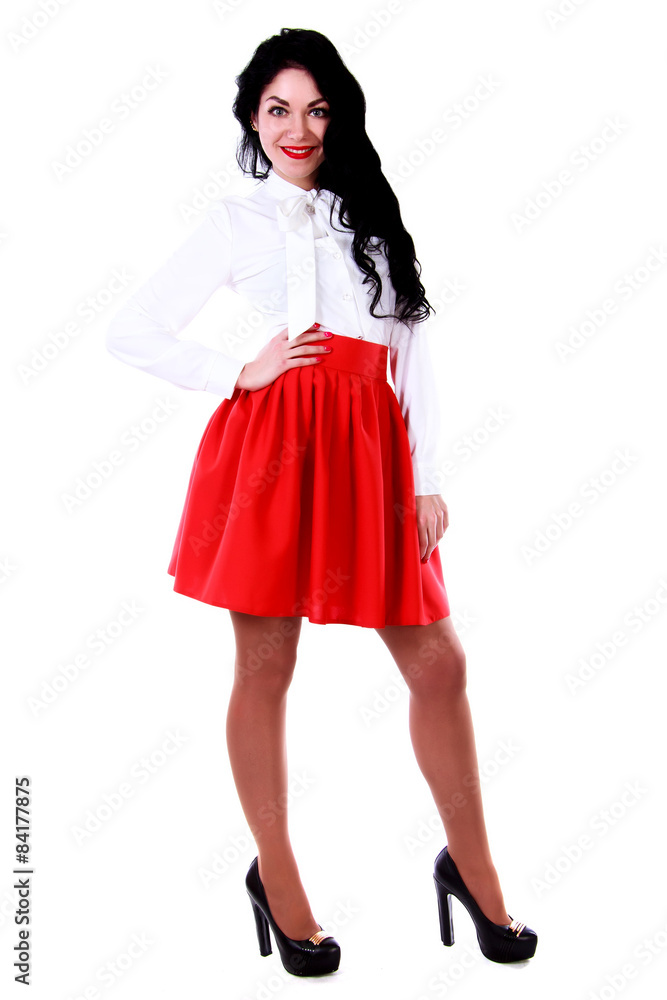 Beautiful young woman in a white blouse and a red skirt Beautiful young woman in a white blouse and a red skirt