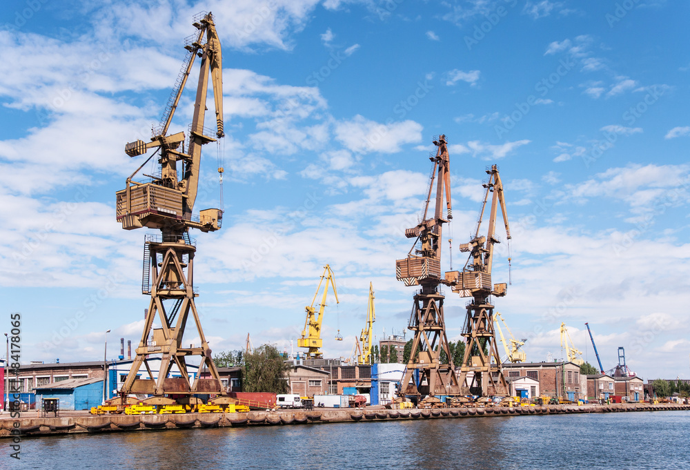 Cranes in repair shipyard in Gdansk, Poland Cranes in repair shipyard in Gdansk, Poland