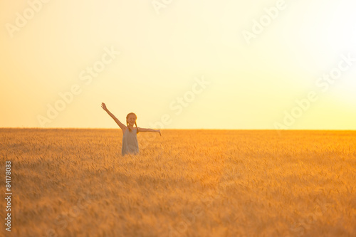 girl on a wheat field