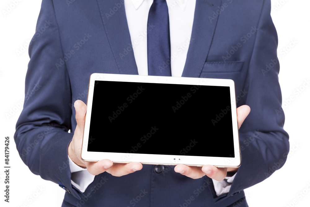 Businessman displaying a tablet computer, isolated on white back Businessman displaying a tablet computer, isolated on white back