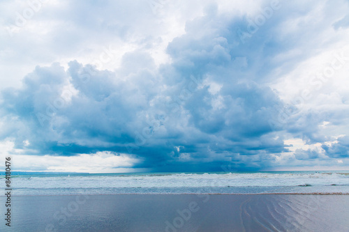 Tropical beach and beautiful sea. Blue sky with clouds 