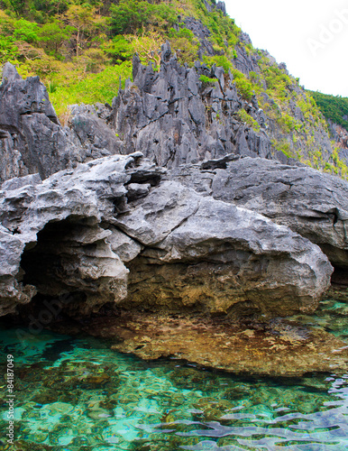 Rocks and sea. On a tropical island. Philippines.